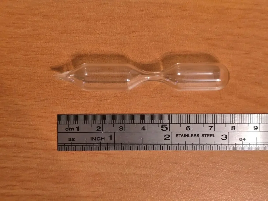 Glass vial containing low pressure O2 gas